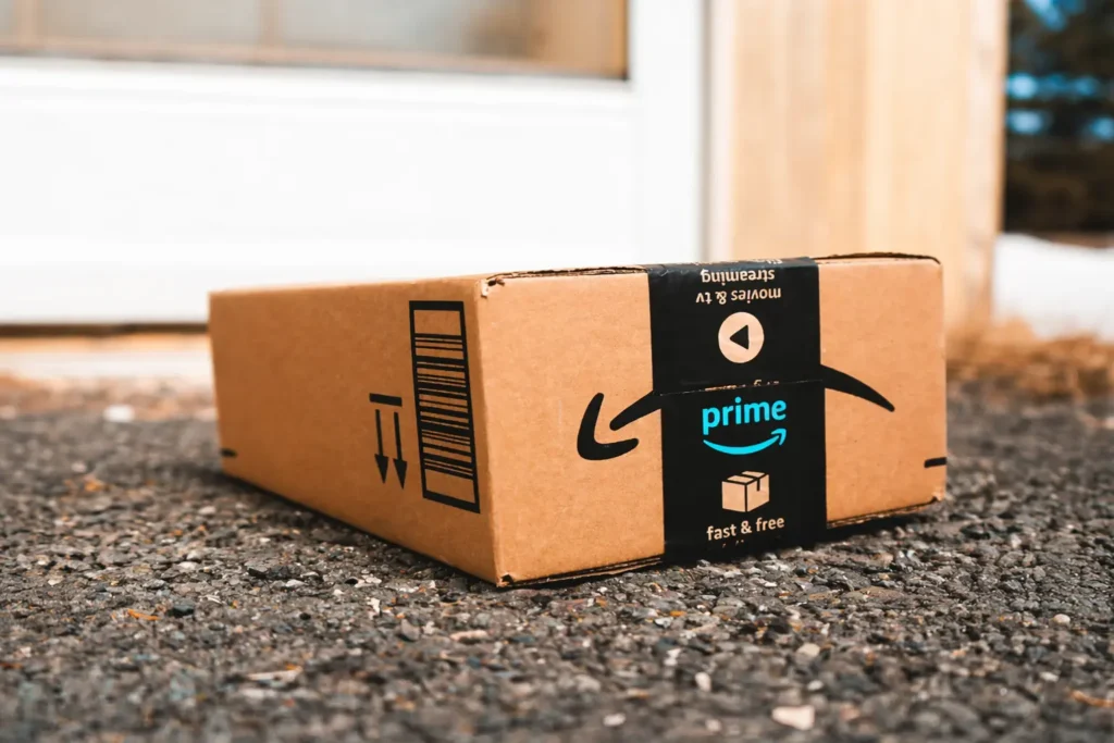Amazon prime box on asphalt